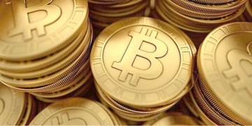 Bitcoin's iconic logo amidst Canadian mining equipment, symbolizing 2025's investment surge